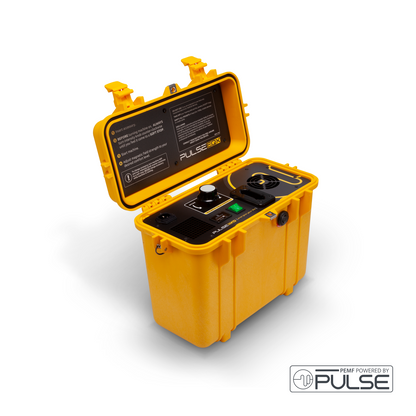A compact yellow Pulse EQ-X PEMF machine with its lid open, showing control dials and setup instructions, designed for portable animal and equine therapy sessions.